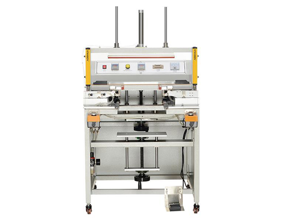 Pneumatic corner cutting and sealing machine
